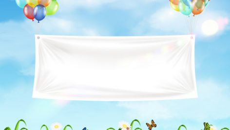White Vinyl Banner Floating With Colorful Balloon