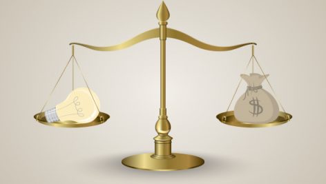 Freepik Light Bulb And Money Balance On Golden Scale