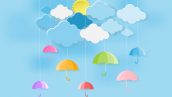 Freepik Colorful Umbrella With Cloud On Blue Sky